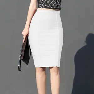 Close-up of high-waisted white bandage pencil skirt showing textured fabric and bodycon fit.