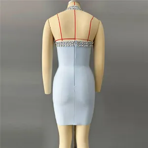 Light blue halter bandage dress with rhinestone detailing shown from the back view