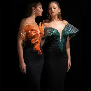 Elegant floor-length bandage dress featuring intricate 3D beadwork and ruffled bodice.