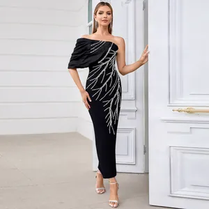 Elegant black one-shoulder bandage evening gown with silver rhinestone branch patterns