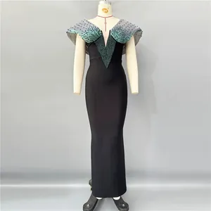 Elegant black bandage maxi dress featuring intricate gradient beadwork on the deep V-neckline.