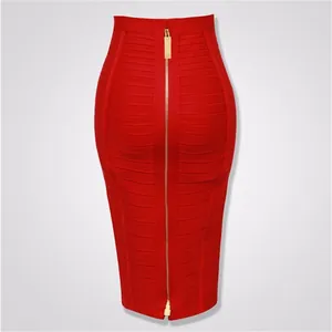 Close-up back view of a red bandage midi skirt featuring a full-length gold zipper