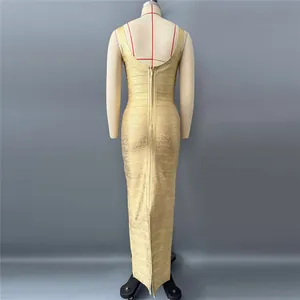 Rear view of a premium gold metallic bandage maxi dress with zipper on a dress form