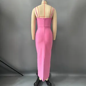 Back view of pink bandage dress on mannequin showing zipper detail and slim fit design