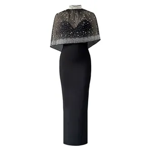 Elegant black floor-length evening gown featuring a sheer rhinestone cape and pearl collar.