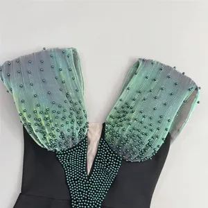 Close-up detail of luxury beaded bandage ball dress featuring iridescent pleated straps