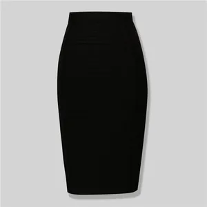 Close-up of black high-waisted bandage skirt with bodycon fit and horizontal ribbing