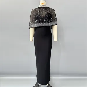 Elegant black evening gown featuring a rhinestone-embellished cape and pearl collar