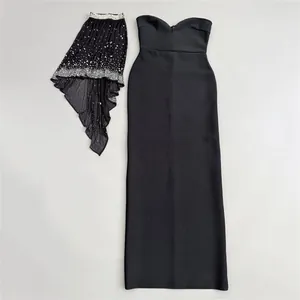 Elegant black bandage dress set featuring a rhinestone-embellished asymmetrical shawl.