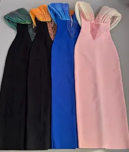 Detailed view of floor-length beaded bandage dresses in pink, blue, and black colors.