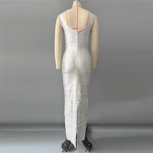 Elegant silver metallic bandage gown back view with zipper closure and slim fit design