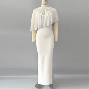 Elegant white bandage evening dress featuring a sheer rhinestone embellished capelet