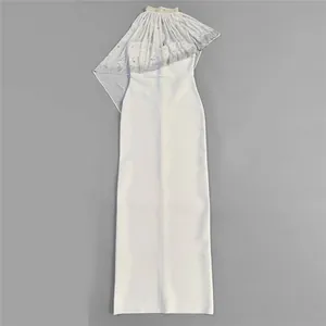 Elegant white bandage evening gown with a sparkling rhinestone mesh shawl overlay