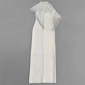 Back view detail of elegant white evening dress with sparkling rhinestone cape overlay