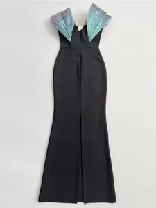Elegant black bandage maxi dress with beaded iridescent pleated wing accents for gala