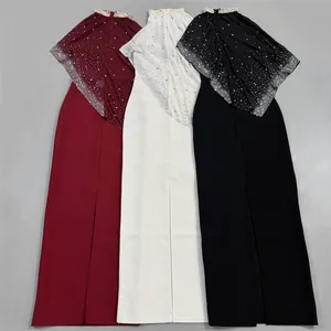 Detailed view of elegant evening gowns with sparkling rhinestone capes in three colors