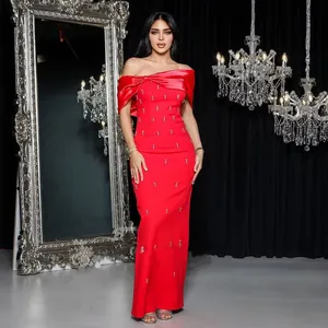 Elegant red off-shoulder bandage evening gown featuring sparkling rhinestone accents