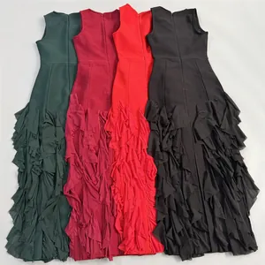 Detailed view of floor-length sleeveless evening gowns with tiered ruffles in four colors