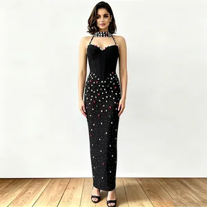 Elegante vestido vendaje negro con pedrería y falda larga de gala