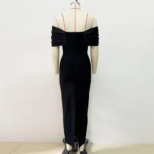 Back view detail of elegant black off-shoulder bandage maxi dress with slit
