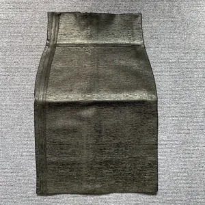 Detail view of metallic elastic high-waist bandage mini skirt with textured finish