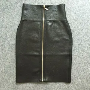 Detail shot of the front gold zipper on a black high-waisted bandage bodycon skirt