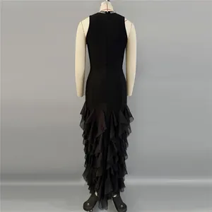 Detailed back view of elegant black bandage evening dress with ruffled mermaid hem
