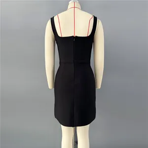 Back view of a black bandage mini dress featuring a central zipper closure on a mannequin.