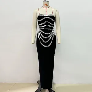 Front view of elegant black bandage evening dress with wavy silver rhinestone embellishments