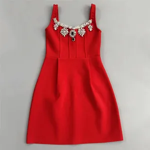 Elegant red mini bandage party dress featuring luxury crystal flower neckline embellishments.