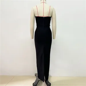 Back view of an elegant black slim fit bandage evening maxi dress displayed on a mannequin.