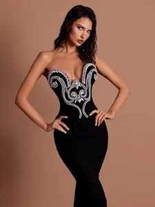Elegant black strapless bandage dress with intricate silver rhinestone detailing for parties