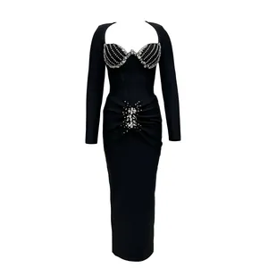 Close-up of elegant black bandage dress with intricate rhinestone embellishments