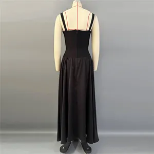 Back detail of elegant black bandage evening gown with camisole straps and long skirt
