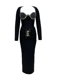 Elegant black long sleeve bandage evening gown featuring heavy rhinestone embellishments