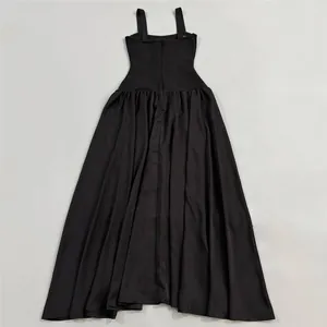 Back view of black bandage maxi dress featuring sleek straps and gathered skirt