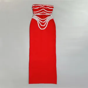 Detailed view of the luxury red bandage dress featuring intricate rhinestone wave patterns