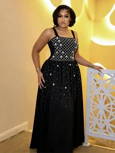 Elegant black evening gown with hot-drill lattice bodice and scattered floral accents
