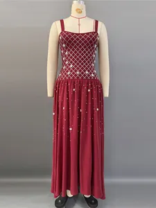 Elegant burgundy spaghetti strap evening gown with pearl and rhinestone embellishments