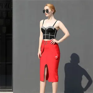 Elegant red high-waist bandage skirt featuring a front slit and designer belt detail
