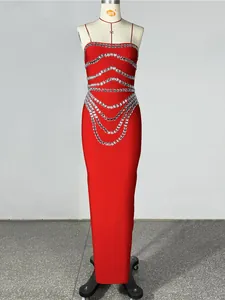 Red strapless bandage dress with rhinestone detailing and bodycon fit for evening events.