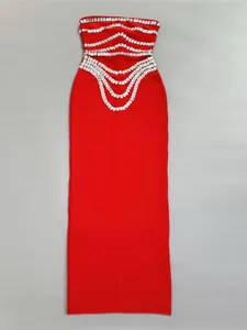 Elegant red bodycon bandage dress featuring heavy rhinestone detailing for evening gala events.