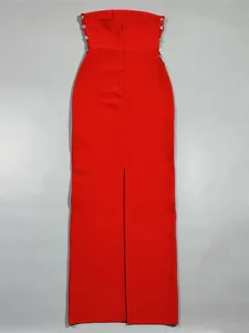 Elegant red strapless bandage maxi dress with sparkling rhinestone details and back slit.