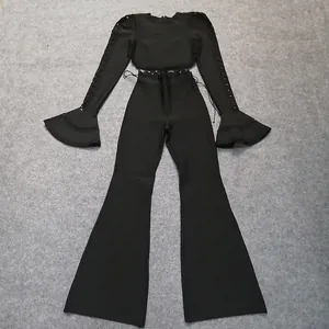 Detailed view of black two-piece bandage set featuring long flared sleeves and cut-outs