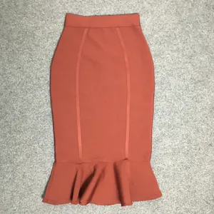 Sophisticated rust red bandage bodycon skirt featuring an elegant ruffled mermaid hem