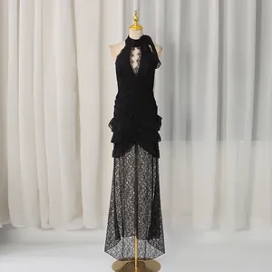 Elegant black lace halter-neck evening dress with deep V-neck and ruffled fishtail skirt
