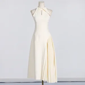 Detailed front view of a French style sleeveless ivory pleated midi dress on mannequin