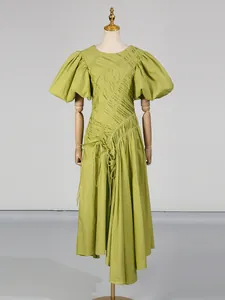Elegant green puff sleeve pleated dress with irregular hem for resort style