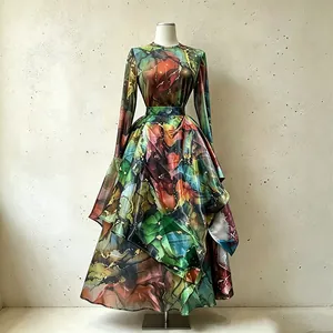 Vintage satin long sleeve top and irregular printed skirt two-piece set for women.