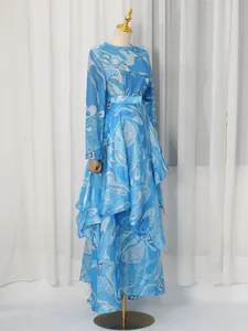 Elegant blue printed two-piece outfit with long sleeve top and irregular hem maxi skirt